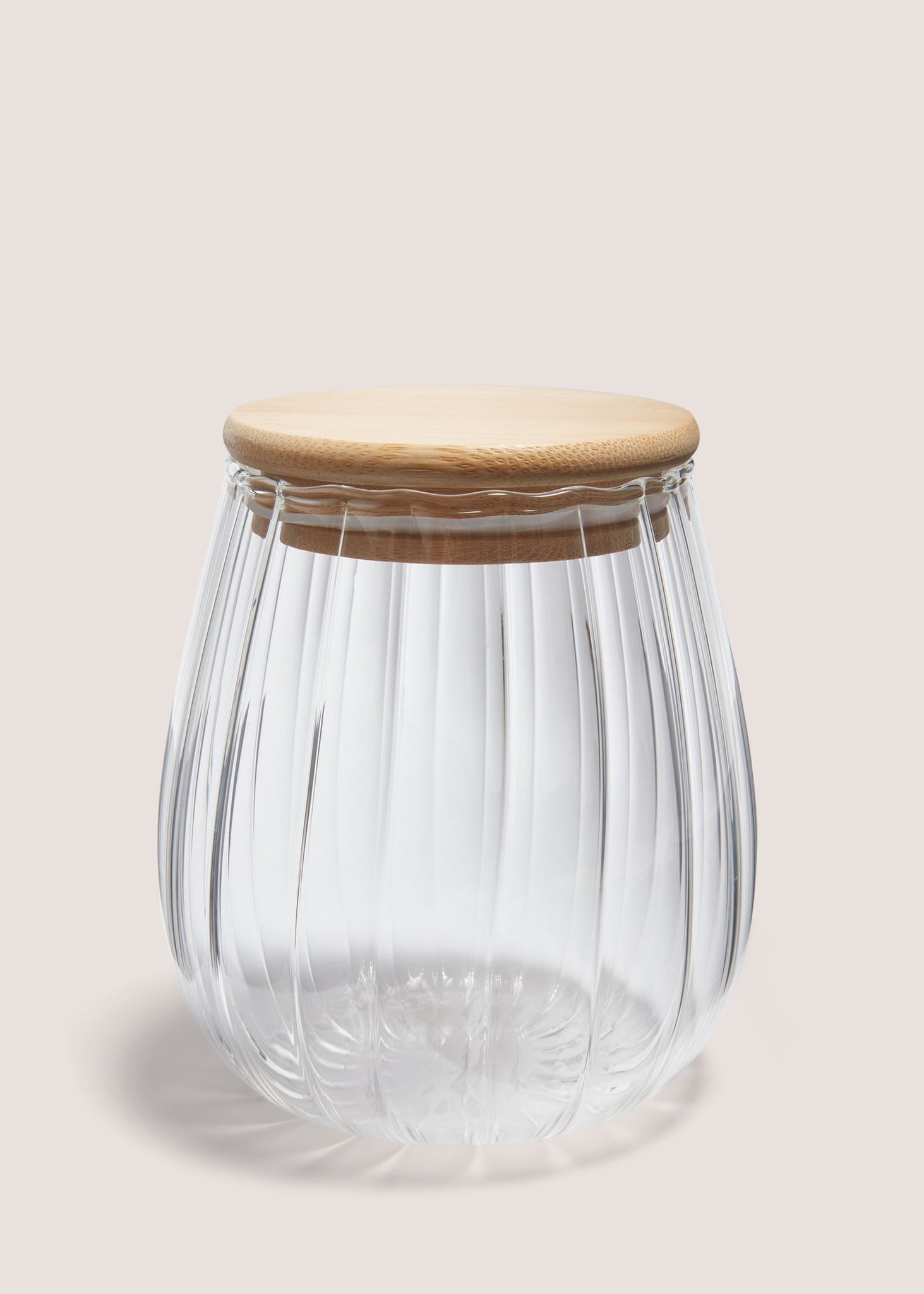Small Curved Ribbed Glass Jar (10cm x 8cm) Clear M484654